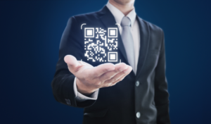 man holding qr code